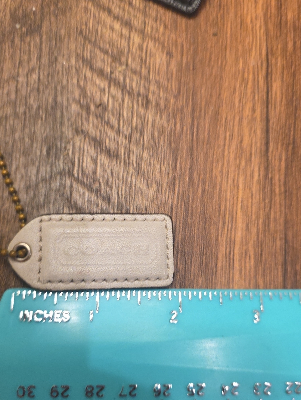 Coach Off White Y2k leather Hangtag with brass chain
